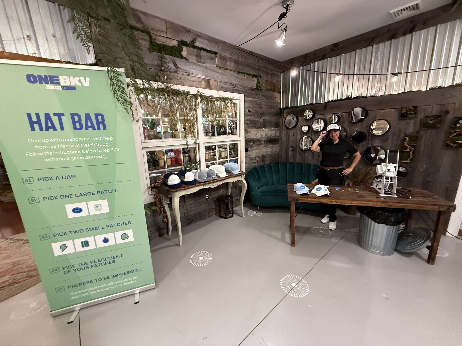 Live merch booth set up and glowing before guests arrive at an evening event
